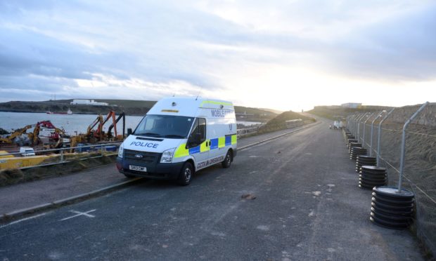 Police at the Aberdeen Harbour site.