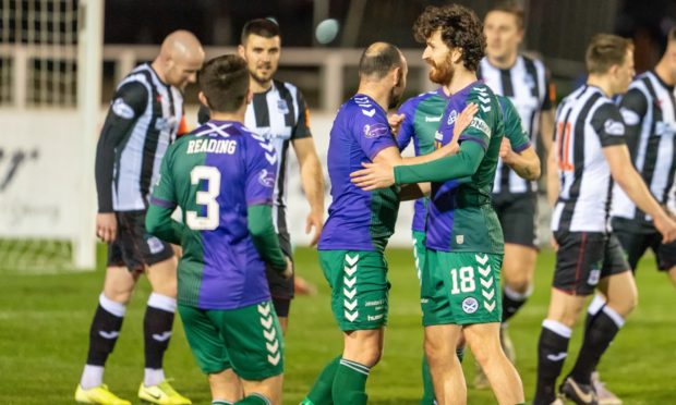 Joe Chalmers is congratulated after opening the scoring for Ayr United against Elgin.