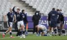 Scotland's Stuart Hogg, second left, celebrates after Scotland's Duhan Van der Merwe scored the winning try. Dobie travelled with the squad to Paris for the game.