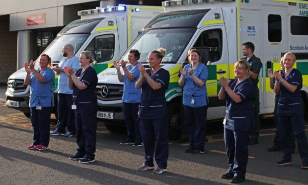 NHS staff across Scotland have been praised for their efforts during an "exceptionally challenging year".