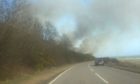 To go with story by Christopher MacLennan. A wildfire near Helmsdale has closed part of the A9 Picture shows; Helmsdale wildfire. Helmsdale. Supplied by Liam Worrall Date; 17/03/2021