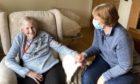 Edenholme care home resident Norah Peddie receives a visit from her daughter Anne Chalmers.