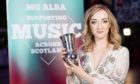 Iona Fyfe has won a battle to have Scots songs recognised on Spotify.