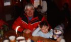 Jenna Rattray and her late grandfather Alan on a Christmas trip to Lapland back in 2006.
