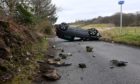 The car overturned on a an unclassified road just outside Udny Green.