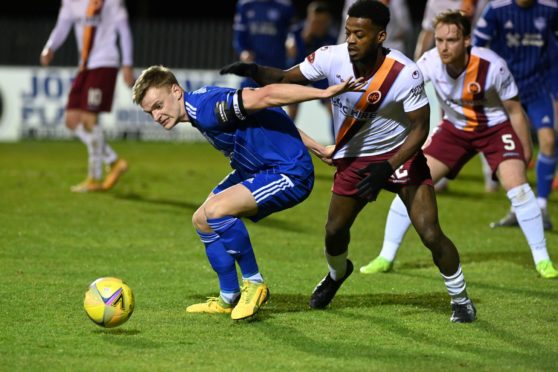 Peterhead defender Jason Brown in action against Stenhousemuir in the Scottish Cup.