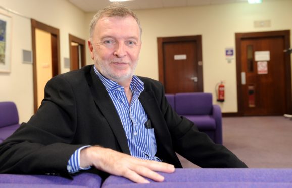 Depute leader councillor Alasdair Christie pictured in Highland Council HQ before the pandemic