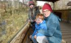 Amy Holtby with son Archie (6) and friend Amelia Clark (7) enjoy the sights of the park.