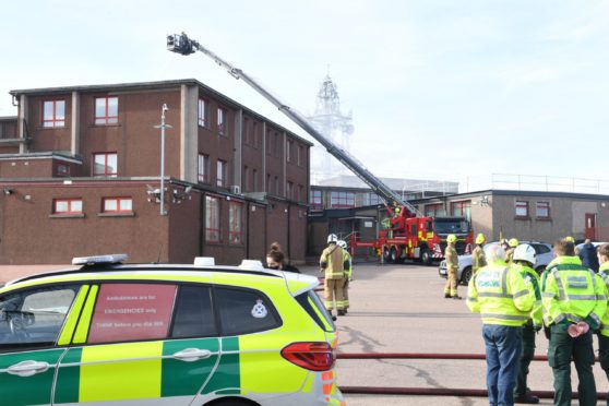 Crews tackle the fire at Northfield Academy yesterday. Picture by Kami Thomson