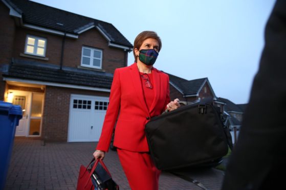 Nicola Sturgeon pictured leaving her home prior to giving evidence to the Scottish Parliament's inquiry.
