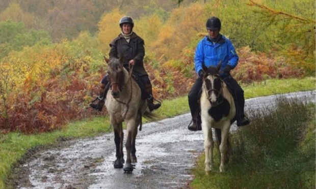 Intrepid Perthshire horse rider Karen Inkster on Monty and TV explorer Paul Murton on Connie.