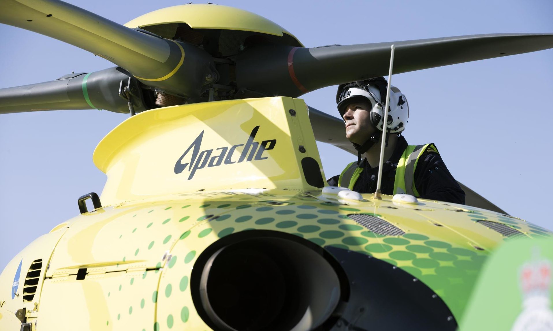 Captain Pete Winn checks the rotor head on Helimed 79.