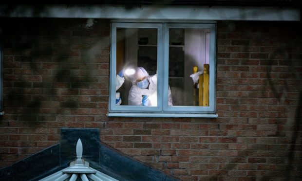 Forensics at the scene in Troon Avenue.