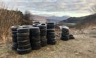 More than 150 tyres have been dumped close to the Attadale Estate in Strathcarron.