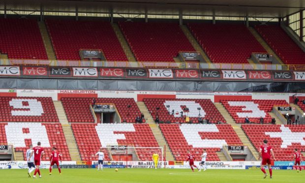 A general view of the empty stands during the Scottish Premiership match between Aberdeen and Rangers at Pittodrie in August.