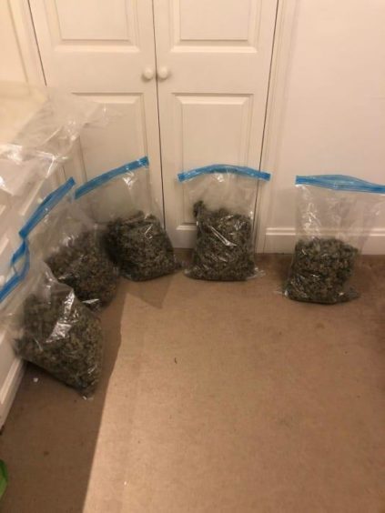 Crack cocaine, heroin and cannabis has been seized in UK-wide raids, along with £150,000 cash and a suspected handgun