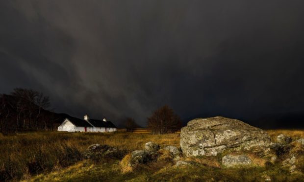 Mandatory Credit: Photo by Robert Seitz/imageBROKER/Shutterstock (10090736a)
Black Rock Cottage in front of thunderstorm with Glen Coe, Rannoch Moor, west Highlands, Scotland, United Kingdom, in the background
VARIOUS