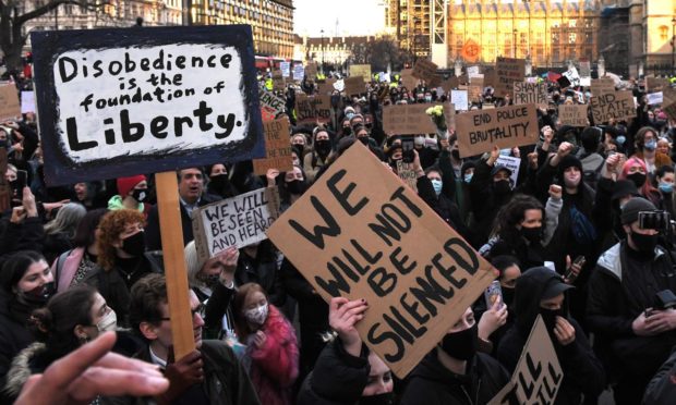 Demonstrators during a Reclaim the Streets protest in Parliament Square, central London, in memory of Sarah Everard