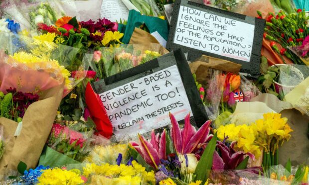 Flowers left at a vigil for Sarah Everard after her murder