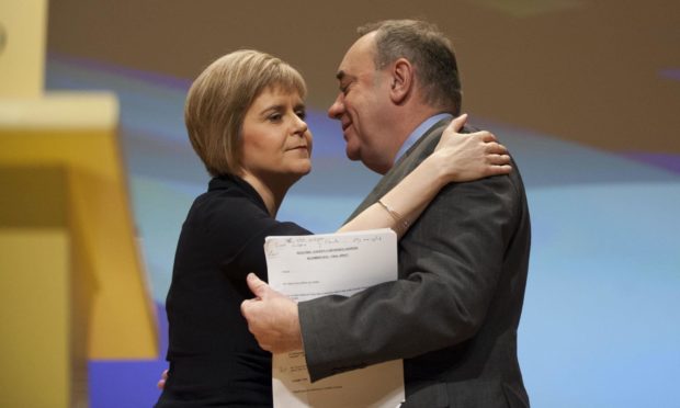 Mandatory Credit: Photo by Jane Barlow/Shutterstock (4244436j)
Nicola Sturgeon and Alex Salmond
80th SNP Annual National Conference, Perth, Scotland, Britain - 14 Nov 2014
Scotland's First Minister Alex Salmond and former party leader with new party leader and soon to be First Minister Nicola Sturgeon. Nicola Sturgeon was officially declared as the party's new leader during the first session of the conference.