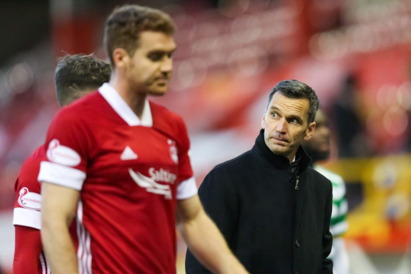 Tommie Hoban and Aberdeen manager Stephen Glass.