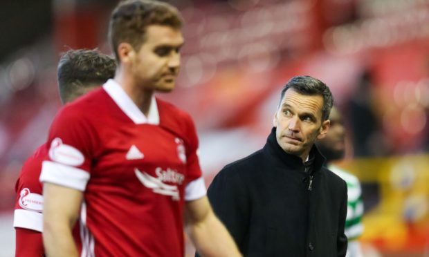 Tommie Hoban and Aberdeen manager Stephen Glass.