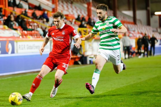 Aberdeen's Matty Kennedy and Greg Taylor of Celtic.