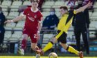 Ethan Ross in action for Aberdeen against Dumbarton.