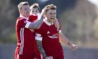 Aberdeen's Callum Hendry celebrates making it 1-0 against Dumbarton in the Scottish Cup.