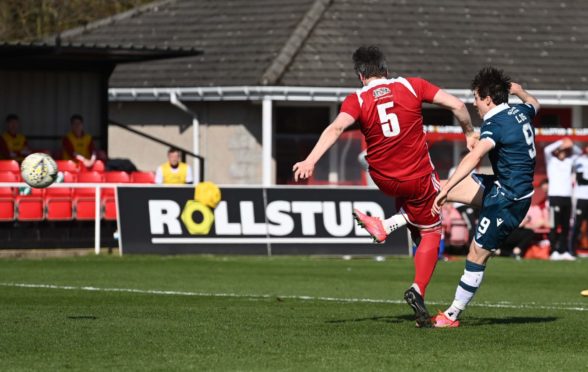 Motherwell's Chris Long makes it 1-0 against Formartine United.