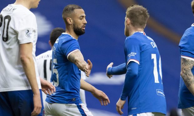 Kemar Roofe scored twice in the first half for a victorious Rangers.