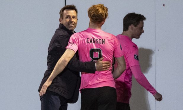 Interim Caley Thistle boss Neil McCann congratulates David Carson after their 4-1 win over Morton.