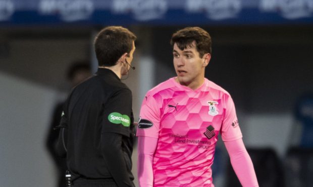Inverness' Nikolay Todorov speaks with referee Steven Reid during a Scottish Championship match between Greenock Morton and Inverness Caledonian Thistle.