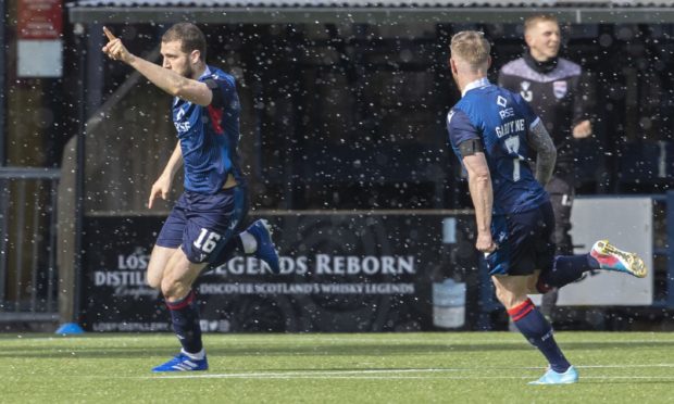 Ross County's Alex Iacovitti celebrates making it 2-2.