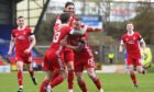 The Aberdeen players celebrate Jonny Hayes scoring to make it 1-0 during the Scottish Premiership match against St Johnstone.