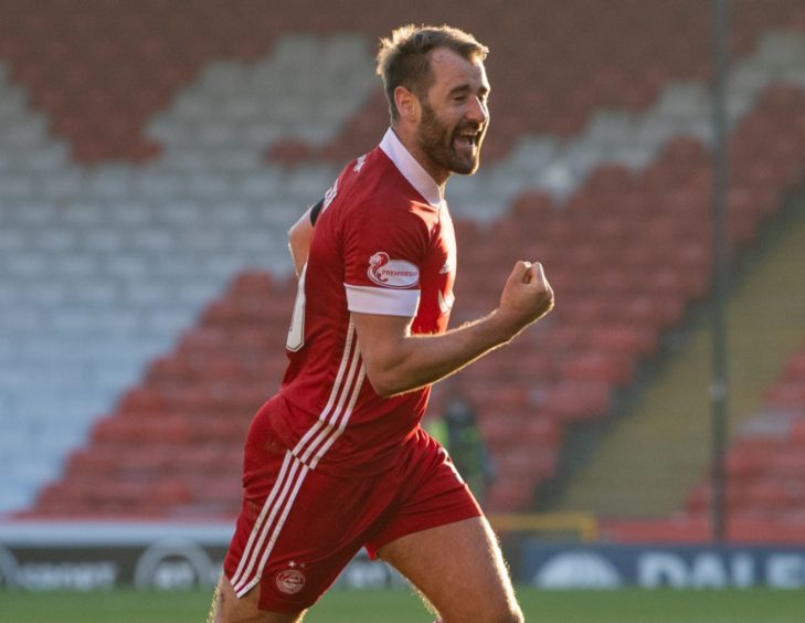 Aberdeen's Niall McGinn celebrates his goal against Livingston to make it 1-1.