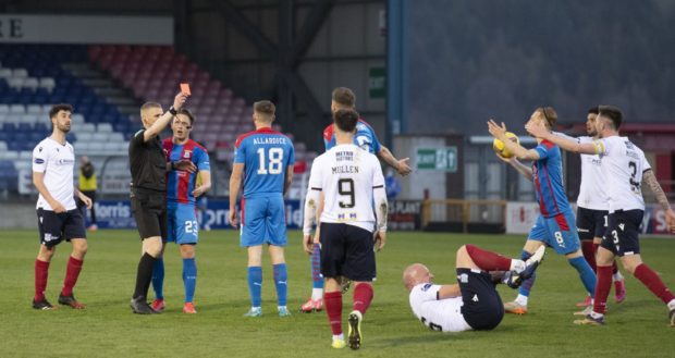 Inverness' Scott Allardice is sent off by referee Mike Roncone for a challenge on Charlie Adam.