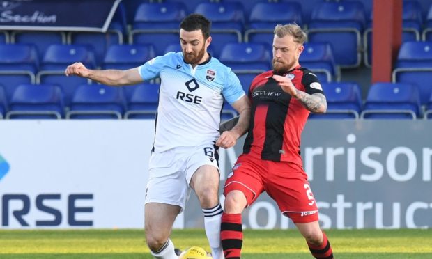 Ross Draper in action for Ross County against St Mirren.