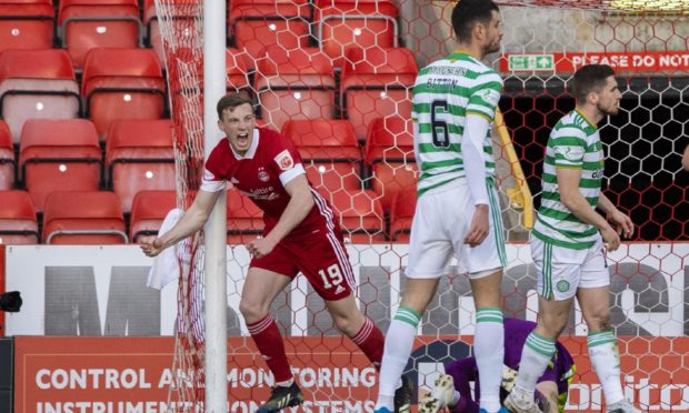 Lewis Ferguson celebrates his opener for Aberdeen.