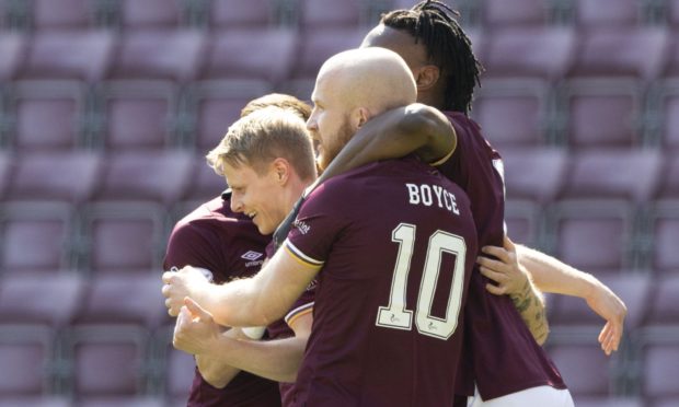 Hearts celebrate Gary Mackay-Steven's opener against Caley Thistle.