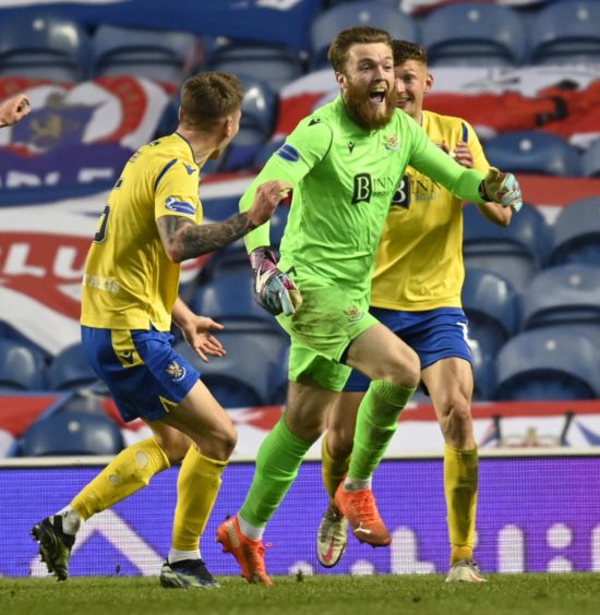 Zander Clark celebrates following St Johnstone's late equaliser at Ibrox