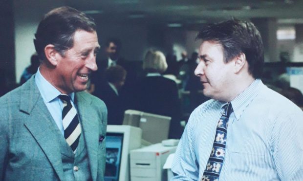 Writer David Knight (right) meets Prince Charles in the P&J offices during the 1990s