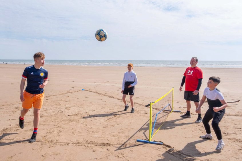 A game of football on St Cyrus beach.
Picture by Paul Reid.