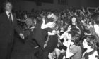 Bedlam at the Bay City Rollers 1975 gig in the Capitol, as ushers thwarted fans trying to rush the stage.