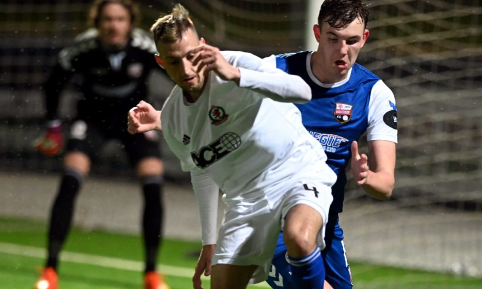 Cove Rangers midfielder Connor Scully in action against Montrose.