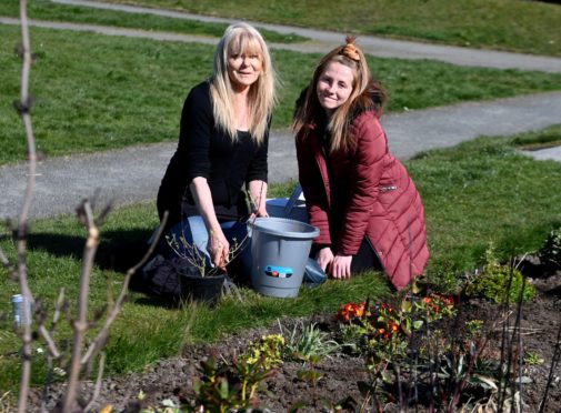 Peterhead Civic Pride volunteer and leader Theresa Ritchie, pictured left with her daughter Rebecca, both working at Landale Road community garden.
Pic by Chris Sumner
