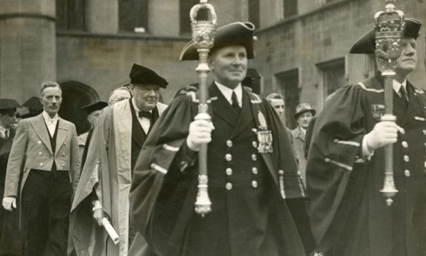Sir Winston Churchill in the procession when he received the honorary degree of LL.D (Doctor of Laws of the University), at Aberdeen University in 1946.