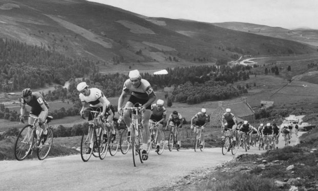 Competitors strain every muscle in an effort to conquer the steep Lecht road at Gairnshiel in 1971 during the second day of the 280 mile Tour of the Grampians Cycle Race..