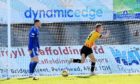 Andrew McDonald, left, watches on after Scott Tiffoney scored Partick Thistle's second against Peterhead.