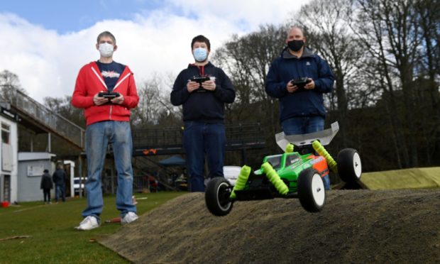 Pictured (L-R) are members of Stonehaven and District Radio Car Club: Steve Harley (Race director), David Scott (secretary) and Chris Briggs (Chairman).